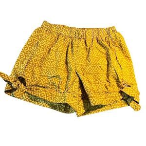 Anthropologie Corey Lynn Calter mustard yellow print side leg tie shorts XS